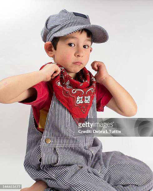 young boy in train engineer costume - kids costume engineer stock-fotos und bilder