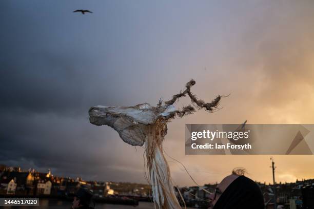 Participants prepare to parade through the streets during the annual Whitby Krampus run on December 03, 2022 in Whitby, England. The Krampus is a...