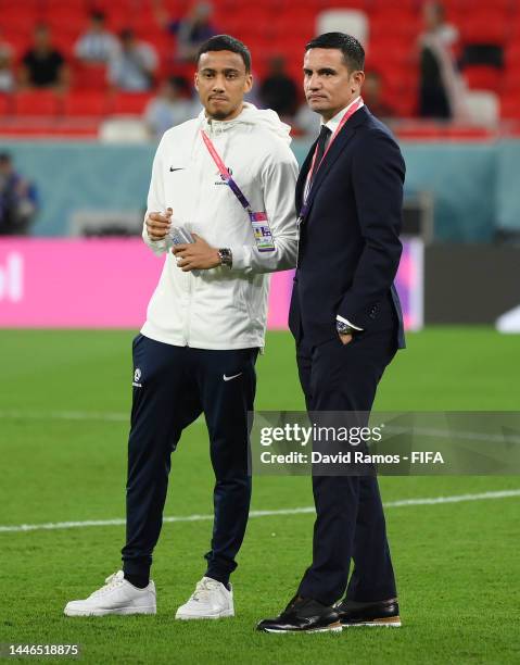 Tim Cahill, Australia Head of Delegation, inspects the pitch with Keanu Baccus prior to the FIFA World Cup Qatar 2022 Round of 16 match between...