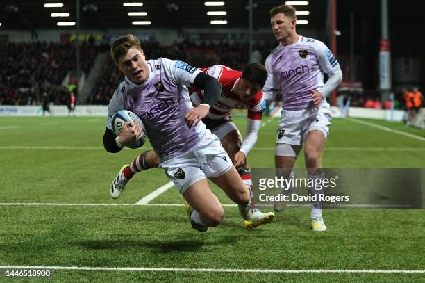 Tommy Freeman of Northampton Saints scores their first try during the Gallagher Premiership Rugby match between Gloucester Rugby and Northampton...