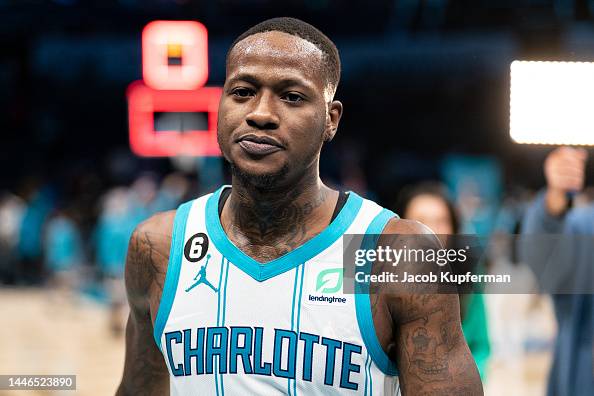 Terry Rozier of the Charlotte Hornets walks off the court after... News ...