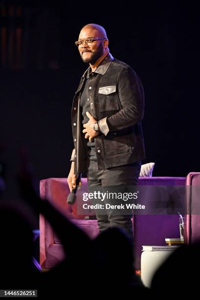 Tyler Perry speaks onstage during the Michelle Obama: The Light We Carry Tour at The Fox Theatre on December 02, 2022 in Atlanta, Georgia.