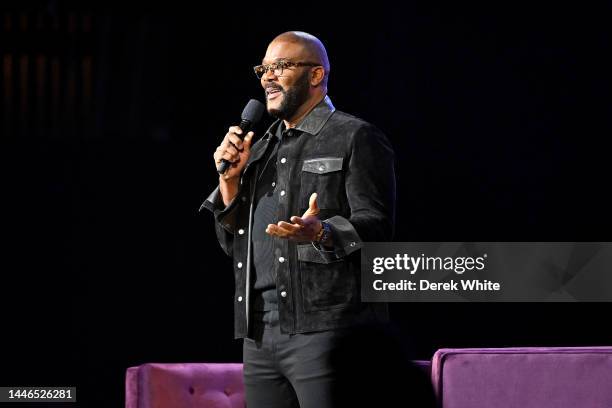 Tyler Perry speaks onstage during the Michelle Obama: The Light We Carry Tour at The Fox Theatre on December 02, 2022 in Atlanta, Georgia.