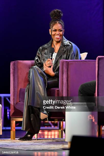 Former First Lady Michelle Obama speaks onstage during the Michelle Obama: The Light We Carry Tour at The Fox Theatre on December 02, 2022 in...