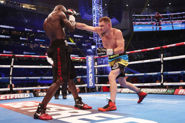 Denys Berinchyk punches Yvan Mendy during the EBU European Lightweight Title fight between Yvan Mendy and Denys Berinchyk at Tottenham Hotspur...