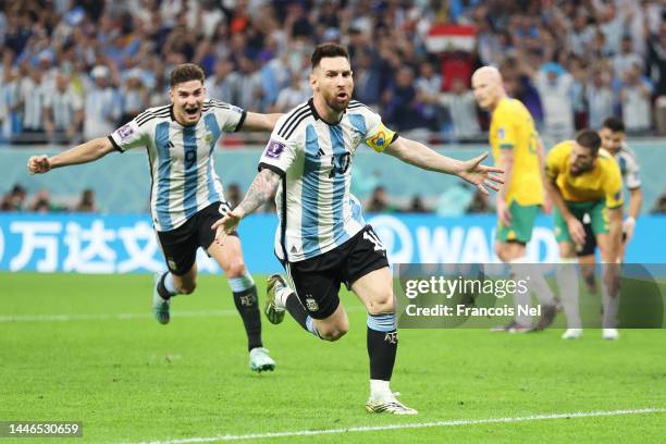 Lionel Messi of Argentina- celebrates after scoring the team's first goal during the FIFA World Cup Qatar 2022 Round of 16 match between Argentina...