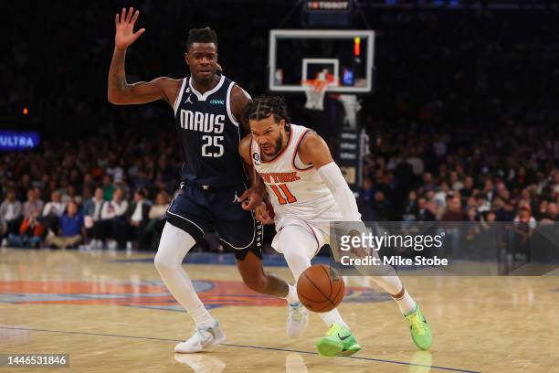 Jalen Brunson of the New York Knicks drives to the net against Reggie Bullock of the Dallas Mavericks at Madison Square Garden on December 03, 2022...