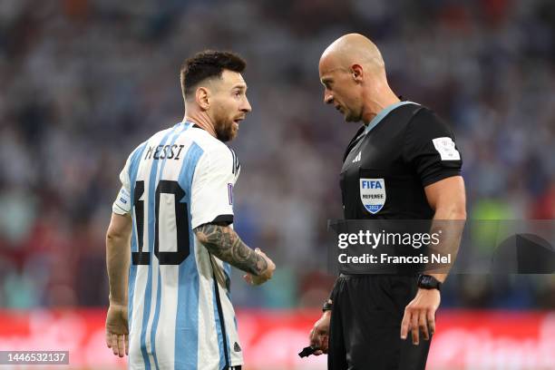 Lionel Messi of Argentina speaks to Referee Szymon Marciniak during the FIFA World Cup Qatar 2022 Round of 16 match between Argentina and Australia...