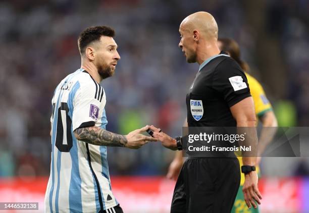 Lionel Messi of Argentina speaks to Referee Szymon Marciniak during the FIFA World Cup Qatar 2022 Round of 16 match between Argentina and Australia...