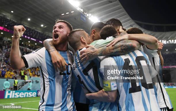 Lionel Messi of Argentina celebrates after scoring the team's first goal during the FIFA World Cup Qatar 2022 Round of 16 match between Argentina and...