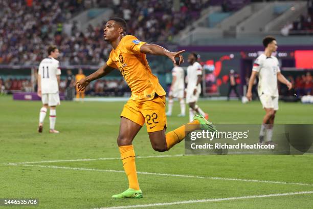 Denzel Dumfries of Netherlands celebrates after scoring the team's third goal during the FIFA World Cup Qatar 2022 Round of 16 match between...