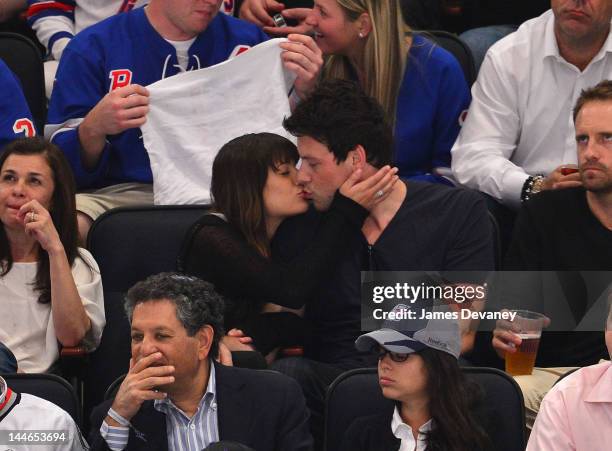 Lea Michele and Cory Monteith attend New York Rangers vs New Jersey Devils playoff game at Madison Square Garden on May 16, 2012 in New York City.