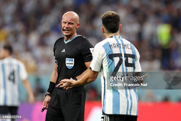 Lisandro Martinez of Argentina protests to Referee Szymon Marciniak during the FIFA World Cup Qatar 2022 Round of 16 match between Argentina and...