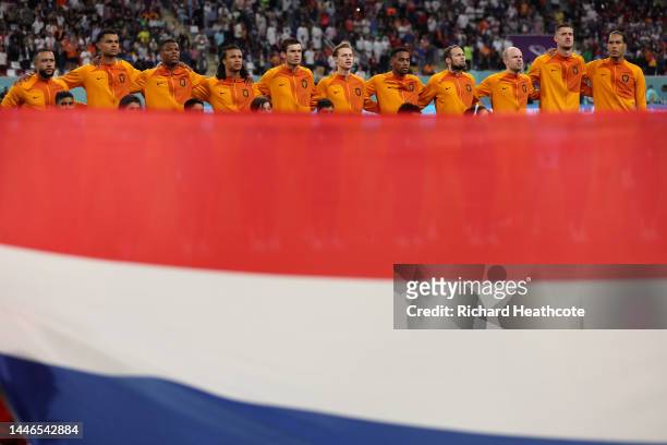 The Netherlands players sing the national anthem during the FIFA World Cup Qatar 2022 Round of 16 match between Netherlands and USA at Khalifa...