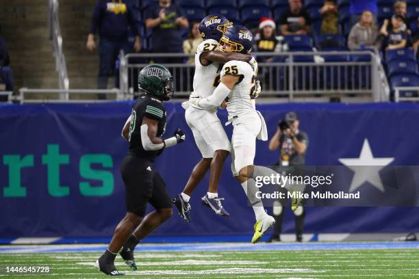 Maxen Hook of the Toledo Rockets and Quinyon Mitchell react after a turnover on downs by the Ohio Bobcats in the fourth quarter of the MAC...