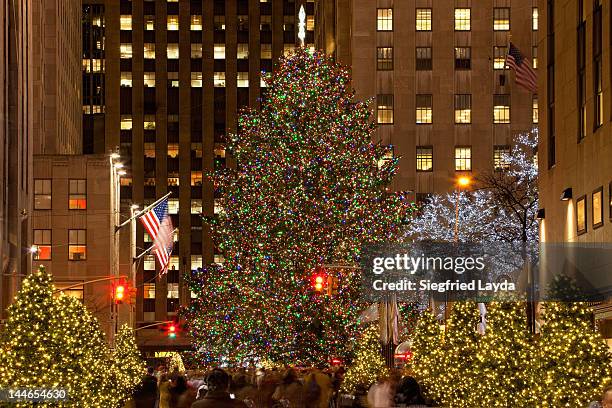 christmas at the rockefeller center from 48th st - rockefeller center christmas tree stock pictures, royalty-free photos & images