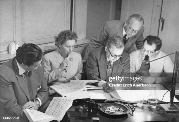 Seated, left to right: German baritone Dietrich Fischer-Dieskau, soprano Elisabeth Schwarzkopf, English producer Walter Legge and German conductor...
