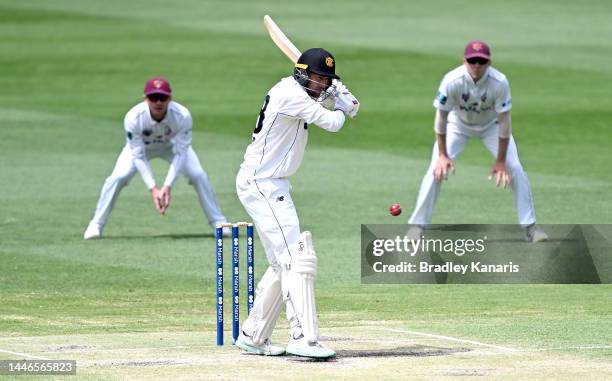 Ashton Agar of Western Australia bats during the Sheffield Shield match between Queensland and Western Australia at The Gabba, on December 04 in...