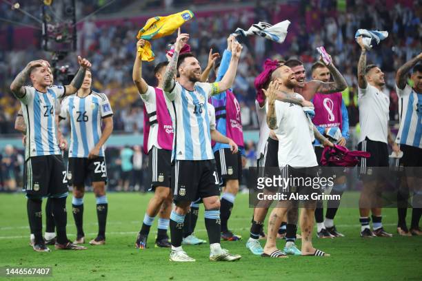 Argentina players celebrate after the team's victory during the FIFA World Cup Qatar 2022 Round of 16 match between Argentina and Australia at Ahmad...