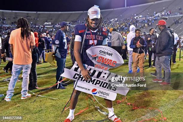 Cam'Ron Silmon-Craig of the Jackson State Tigers celebrates after the game against the Southern University Jaguars in the SWAC Championship at...