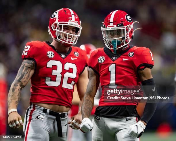 Nyland Green and Chaz Chambliss of the Georgia Bulldogs celebrate a stop during a game between LSU Tigers and Georgia Bulldogs at Mercedes-Benz...