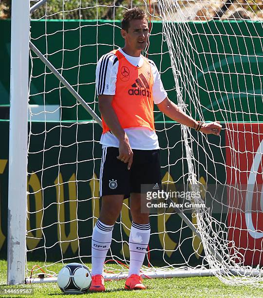 Miroslav Klose looks on during a Germany training session at Campo Sportivo Comunale Andrea Corda on May 17, 2012 in Abbiadori, Italy.