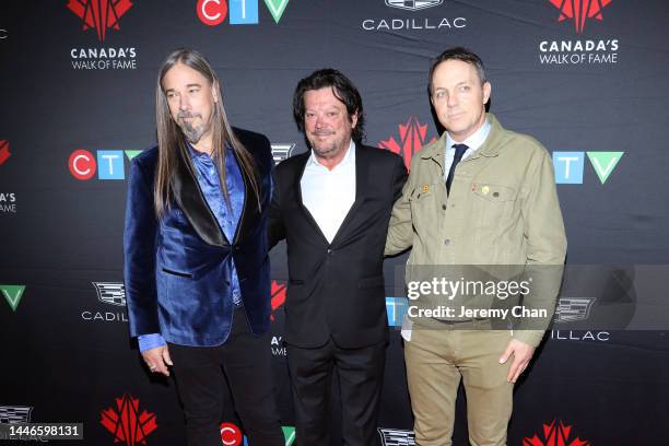 Rob Baker, Paul Langlois and Johnny Fay of The Tragically Hip, 2022 Inductees for Humanitarianism, attend Celebrating Greatness: Canada’s Walk of...