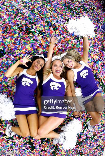 Kansas State Wildcats cheerleaders celebrate after the win over the TCU Horned Frogs in the Big 12 Football Championship at AT&T Stadium on December...