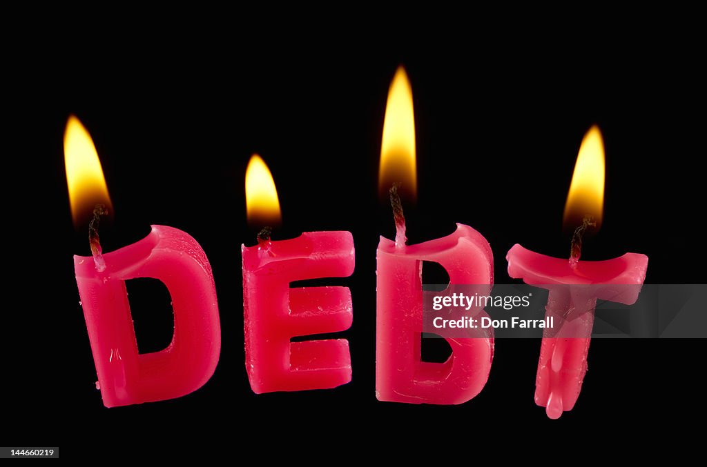 Burning 'debt' candles