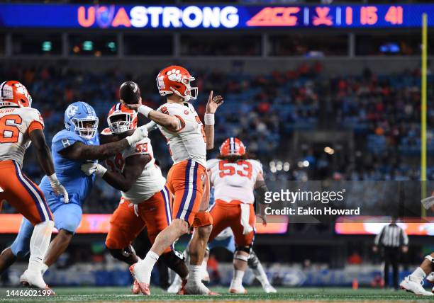 The UVA Strong logo is seen over Cade Klubnik of the Clemson Tigers as he throws a pass in the fourth quarter against the North Carolina Tar Heels...