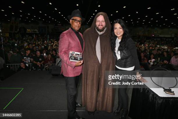 Giancarlo Esposito, Stephen Kramer Glickman and Ming-Na Wen pose on the mainstage for "The Mandalorian" Panel on Day Two of the 2022 Los Angeles...