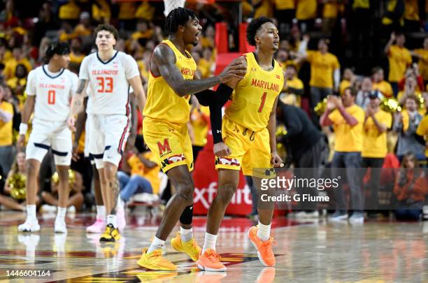 Jahmir Young of the Maryland Terrapins celebrates with Hakim Hart in the second half against the Illinois Fighting Illini at Xfinity Center on...
