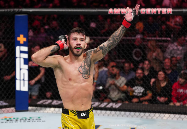 Matheus Nicolau of Brazil reacts after his TKO victory over Matt Schnell in a flyweight fight during the UFC Fight Night event at Amway Center on...