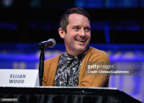 Elijah Wood speaks onstage during "The Lord of the Rings" panel at 2022 Los Angeles Comic Con at Los Angeles Convention Center on December 03, 2022...