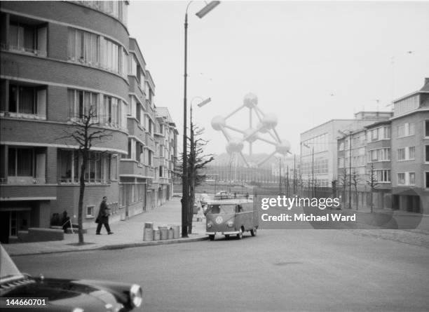 Street in Brussels, Belgium with the Atomium visible at the far end, 1959. Taken for the 'Let's Go' budget travel guide to Belgium.