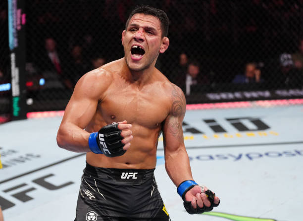 Rafael Dos Anjos of Brazil reacts after his submission victory over Bryan Barberena in a welterweight fight during the UFC Fight Night event at Amway...