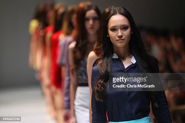 Models showcase designs by YB J'Aime at the Audi Fashion Festival Future Fashion Showcase, which featured designs by Timo Weiland, Yeojin Bae, Esther...