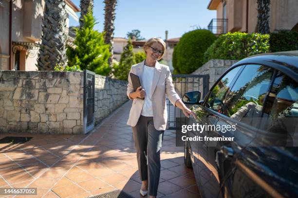 the end of a successful working day - car door stock pictures, royalty-free photos & images