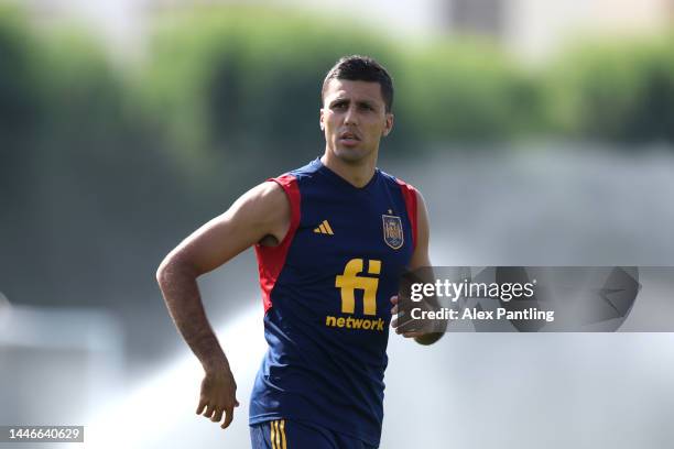 Rodri warms up during Spain training session at Qatar University on December 04, 2022 in Doha, Qatar.