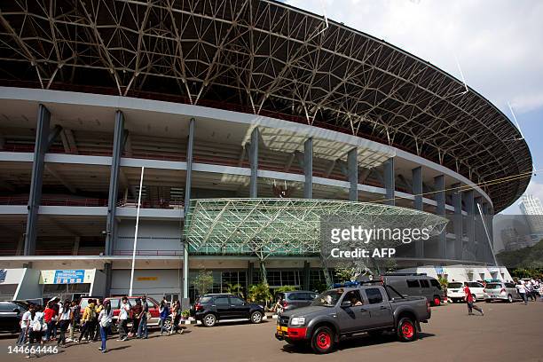 Police vehicle patrol outside the Gelora Bung Karno Stadium in Jakarta on May 17 the venue for the upcoming June 3 Lady Gaga concert. Indonesian...