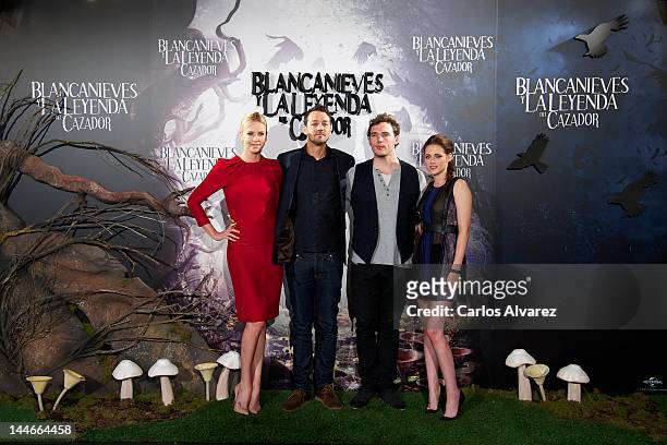 Actress Charlize Theron, director Rupert Sanders, actor Sam Claflin and actress Kristen Stewart attend "Snow White and the Huntsman" photocall at...