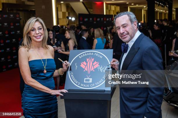 Linda Frum and David Frum attend the unveiling of the Canada’s Walk of Fame 2022 commemorative plaque to celebrate Barbara Frum's induction during...