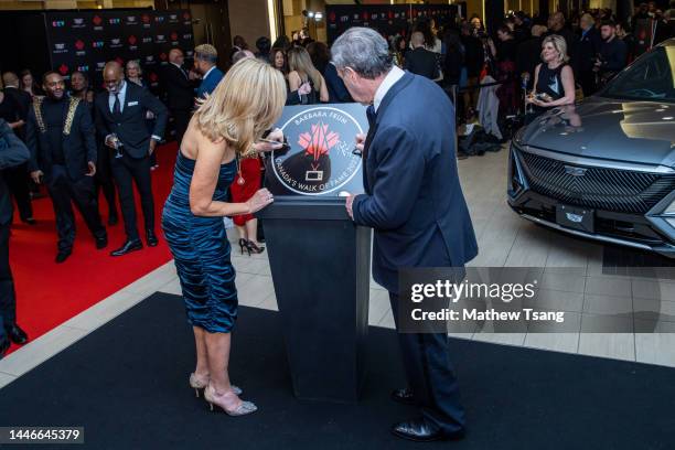Linda Frum and David Frum attend the unveiling of the Canada’s Walk of Fame 2022 commemorative plaque to celebrate Barbara Frum's induction during...