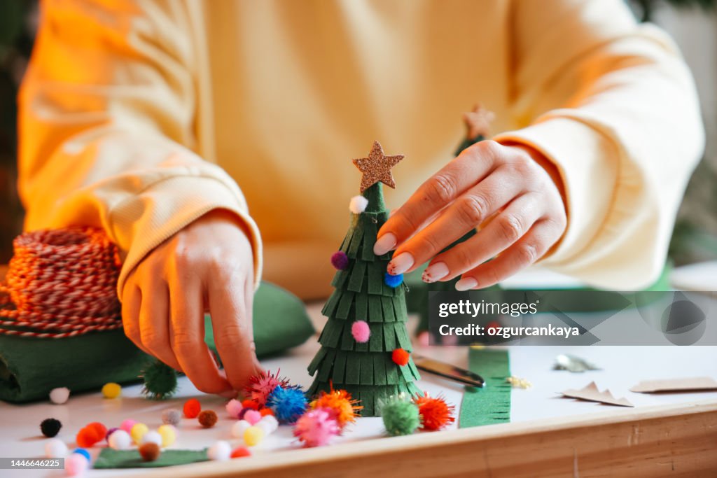Woman wrapping Christmas gifts