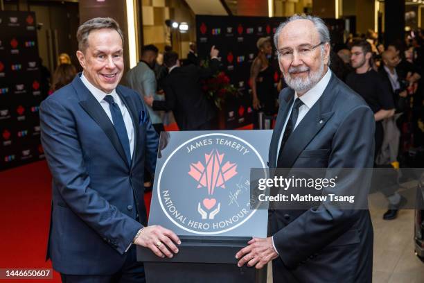 Jeffrey Latimer and James Temerty attend the unveiling of Jame's Canada’s Walk of Fame 2022 National Hero Honouree commemorative plaque during the...