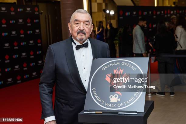 Graham Greene attends the unveiling of his Canada’s Walk of Fame 2021 commemorative plaque for Arts & Entertainment during the 2022 Canada's Walk of...