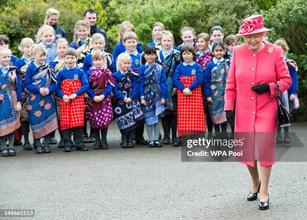 Queen Elizabeth II visits Chester Zoo as part of her tour of the North West on May 17, 2012 in Chester, England. The Queen is visiting many parts of...