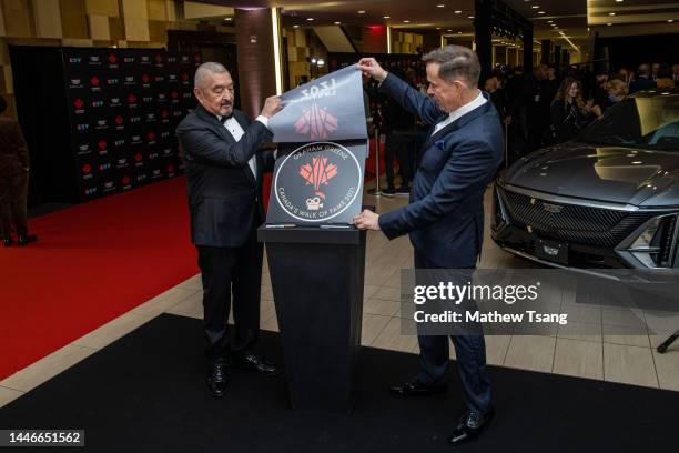 Graham Greene and Jeffrey Latimer attend the unveiling of Graham's Canada’s Walk of Fame 2021 commemorative plaque for Arts & Entertainment during...