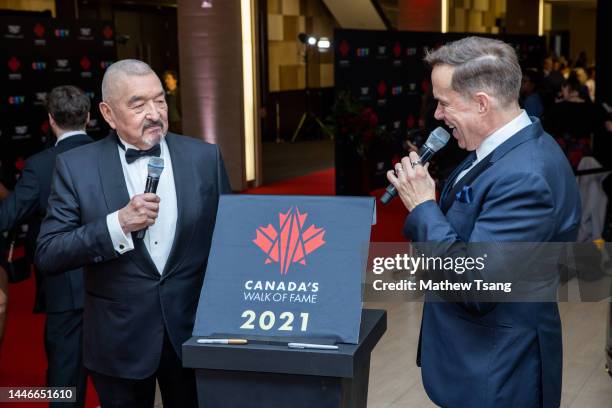 Graham Greene and Jeffrey Latimer attend the unveiling of Graham's Canada’s Walk of Fame 2021 commemorative plaque for Arts & Entertainment during...