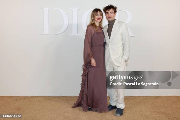 Suki Waterhouse and Robert Pattinson attend the Dior Fall 2023 Menswear Collection on December 03, 2022 in Cairo, Egypt.